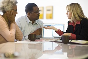 Older Couple Speaking to Professional Advisor